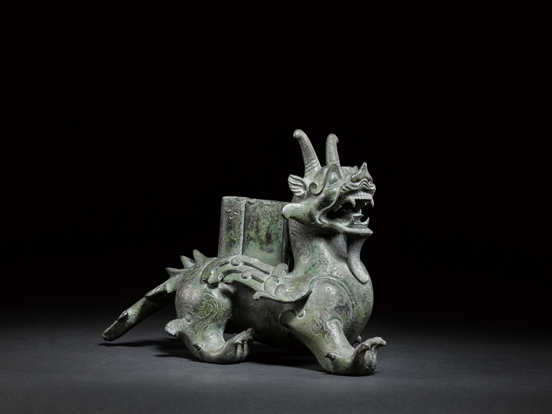 An important and outstanding bronze male chimera, Han dynasty.jpg